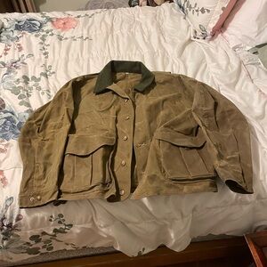 Filson short  wax coat great for work and hunting. 
Will keep you dry